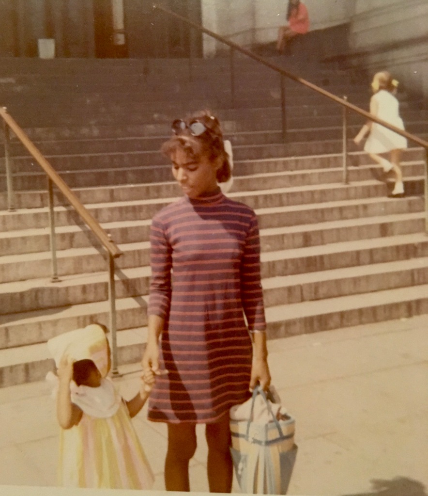 Me and my mother coming out of aa building in New York.