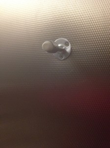 Toilet stall coat hook