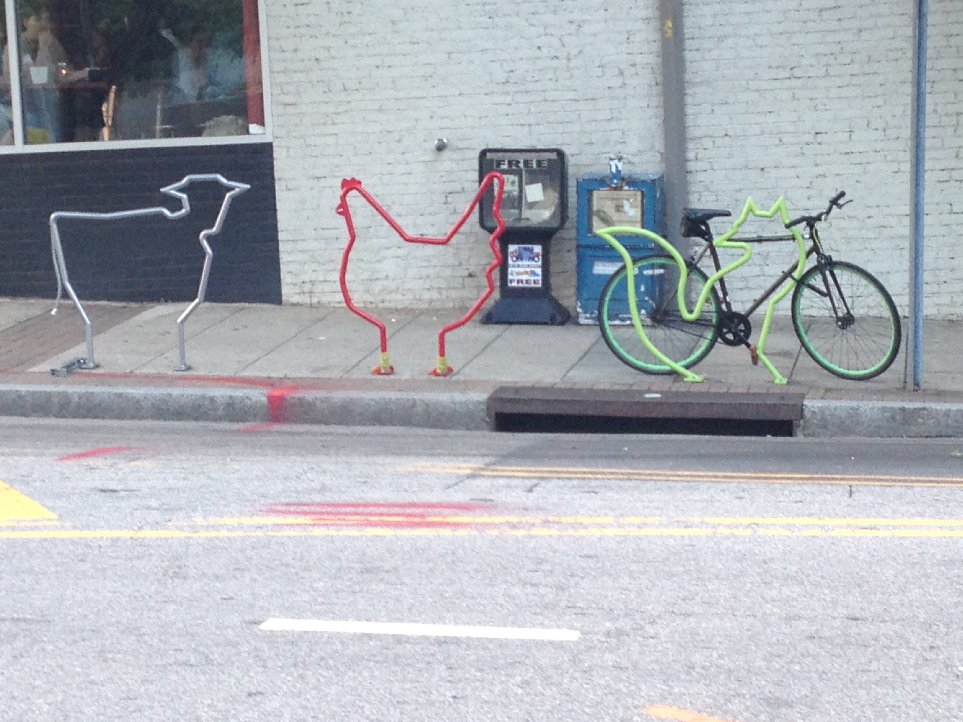 street art of a cow, chicken and fox