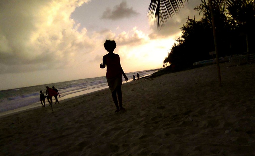 silhouette of lady on the beach