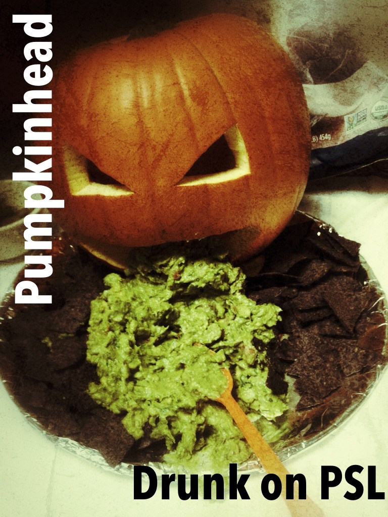 carved pumpkin vomiting guacamole onto blue corn chips