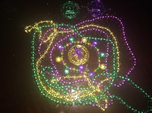 King cake baby, coins and beads