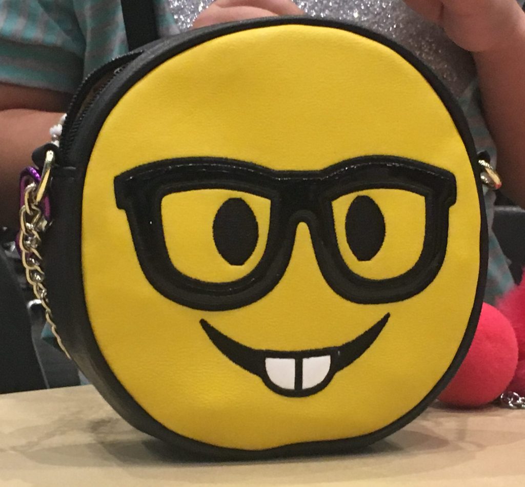 smiley face purse with glasses and teeth