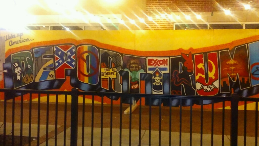 wall mural saying deport Trump